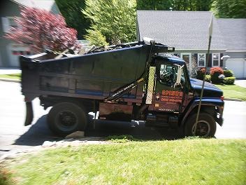 Spino's Paving dump truck at work